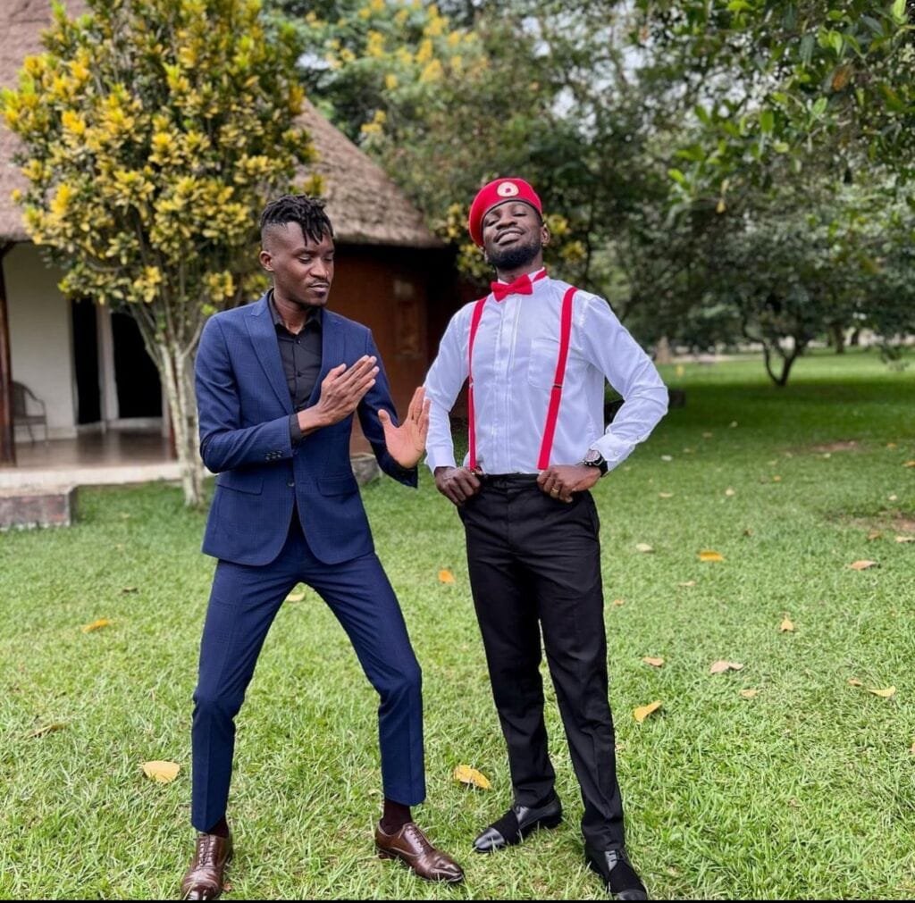 A Pass sharing a moment with Bobi Wine.