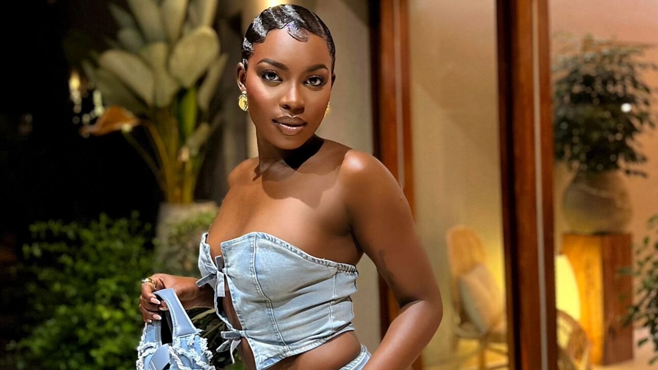 Dance Mamweta attending an event in Kampala.