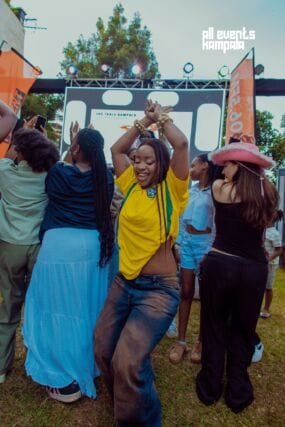 DJ Etania dancing with the teens at Bloomfest