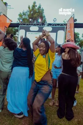 DJ Etania dancing with the teens at Bloomfest