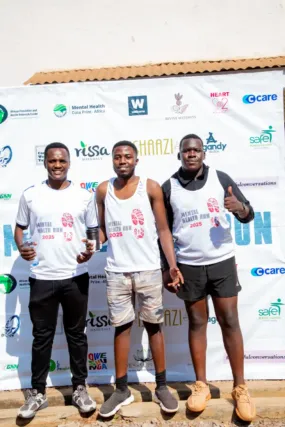 Asaph Muvunyi, Timothy Christian Waniaye and Hamala Baron Edgar at the run