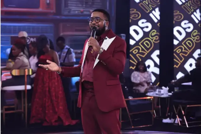 Humphrey Nabimanya the CEO of Reach A Hand Uganda speaking at the event