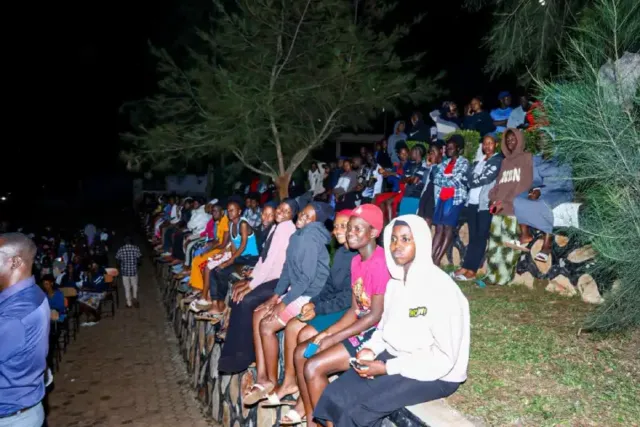 Youths watching film at a cinema in Uganda