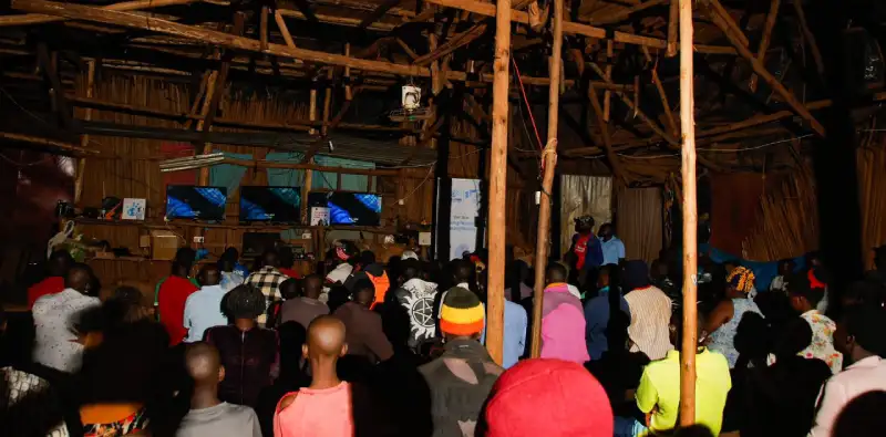 Youths watching film at a cinema in Uganda courtesy of Kwiso Mu Cinema