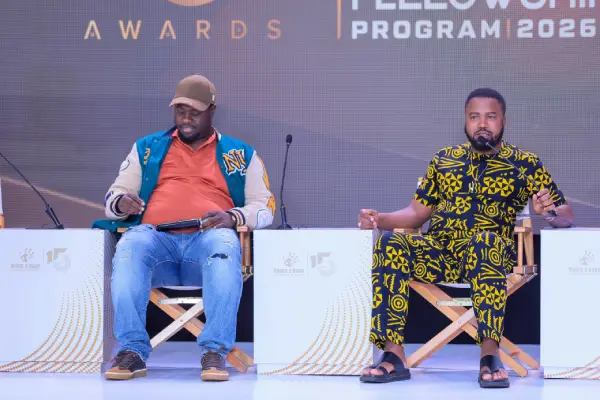 VJ Junior and Reach A Hand Uganda CEO Humphrey Nabimanya at the event