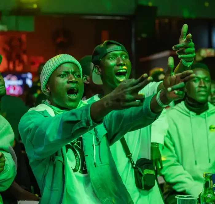Revellers at neon rave