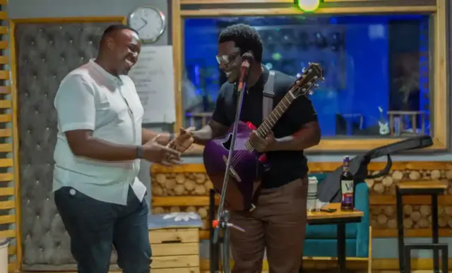 Roy, Brand Manager Mainstream spirits with Kenneth Mugabi
